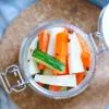 Dưa leo cà rốt ngâm chua ngọt kết hợp cùng củ cải trắng mang đến một món ăn kèm không chỉ giòn ngon mà còn hấp dẫn đến khó cưỡng nữa đấy. Bạn hãy nhanh tay lưu lại công thức và thử làm ngay nhé.
